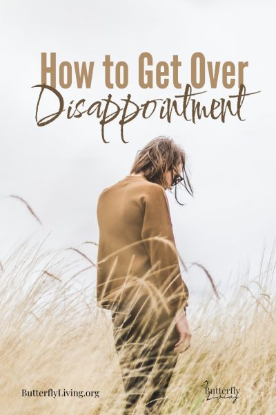 lady looking down-how to get over disappointment